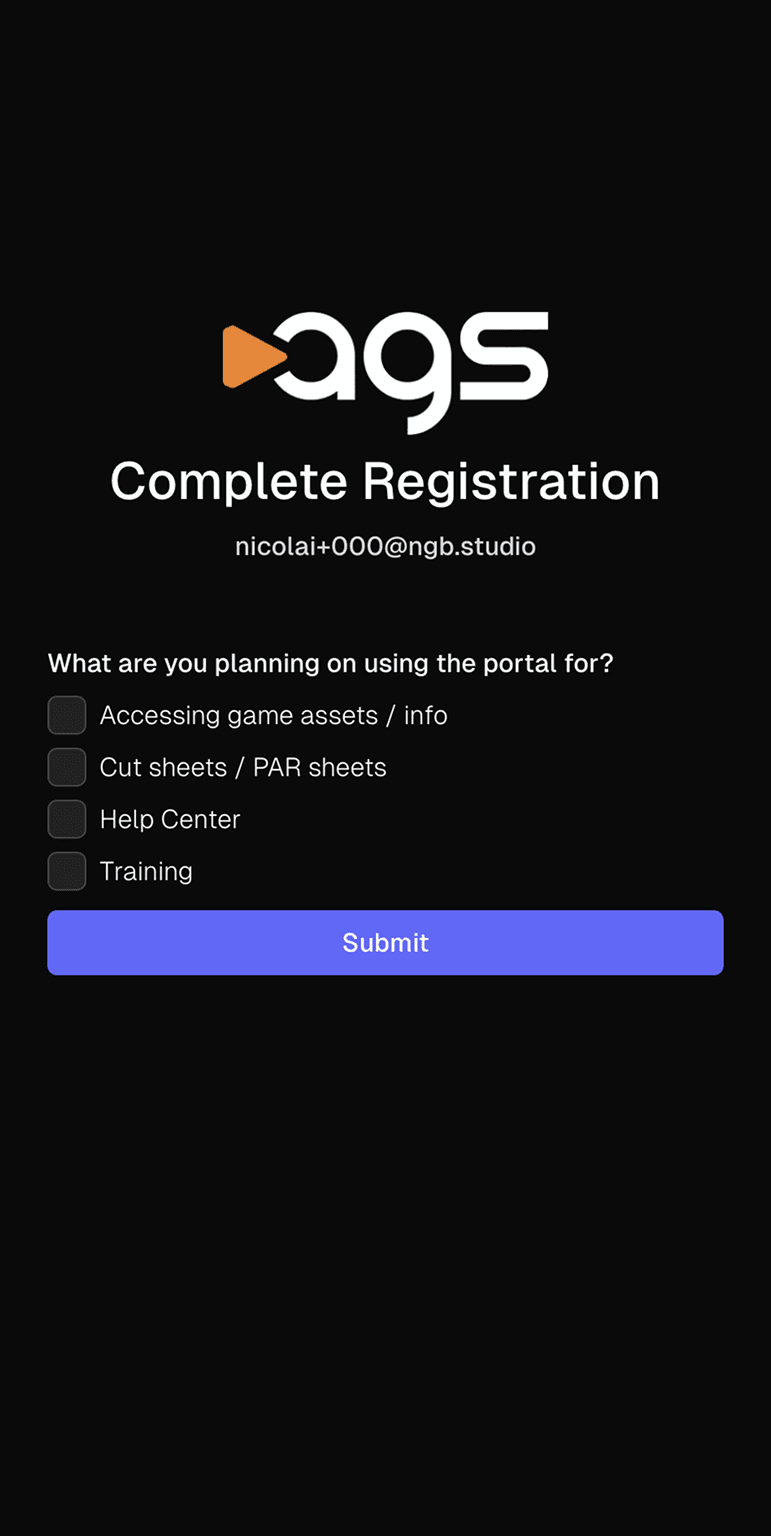 A registration screen with the ags logo (featuring an orange play button triangle next to white letters) on a black background. The page displays "Complete Registration" as a heading, with an email address "nicolai+000@ngb.studio" shown below it. The form asks "What are you planning on using the portal for?" with four unchecked checkbox options: "Accessing game assets / info", "Cut sheets / PAR sheets", "Help Center", and "Training". A purple button labeled "Submit" appears at the bottom of the screen.