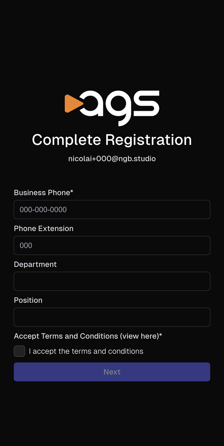 A registration screen with the ags logo (featuring an orange play button triangle next to white letters) on a black background. The page displays "Complete Registration" as a heading, with an email address "nicolai+000@ngb.studio" shown below it. The form contains fields for Business Phone (required, filled with "000-000-0000"), Phone Extension (filled with "000"), Department (empty), and Position (empty). At the bottom is an unchecked checkbox for "Accept Terms and Conditions (view here)*" with text "I accept the terms and conditions" next to it. A purple button labeled "Next" appears at the bottom of the screen.